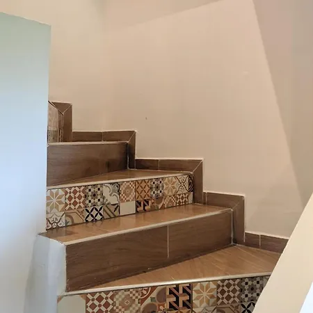 Maison De