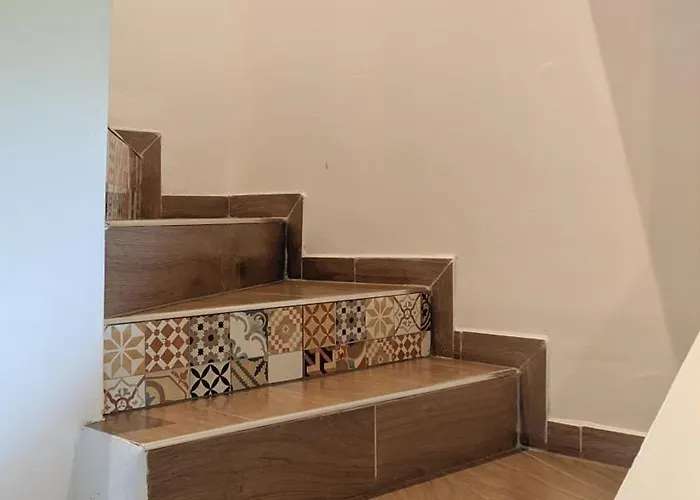 Maison De